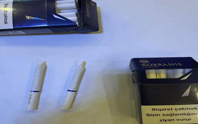 Əri üçün təcridxanaya narkotik keçirmək istədi