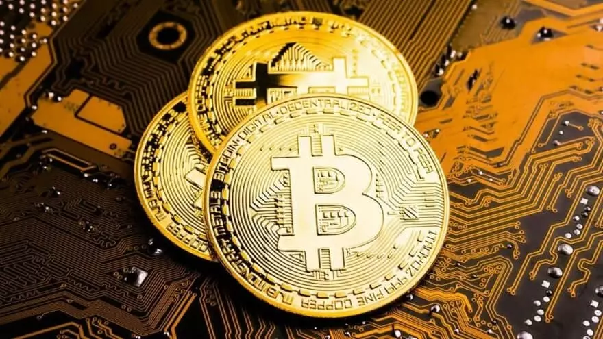 Makron kriptovalyutaları qlobal iqtisadiyyatın sabitliyinə təhlükə adlandırıb