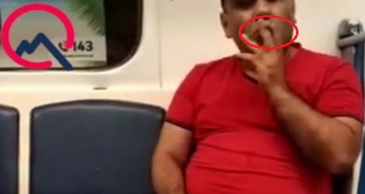 Bakı metrosunda biabırçılıq: qatarda siqaret çəkdi
