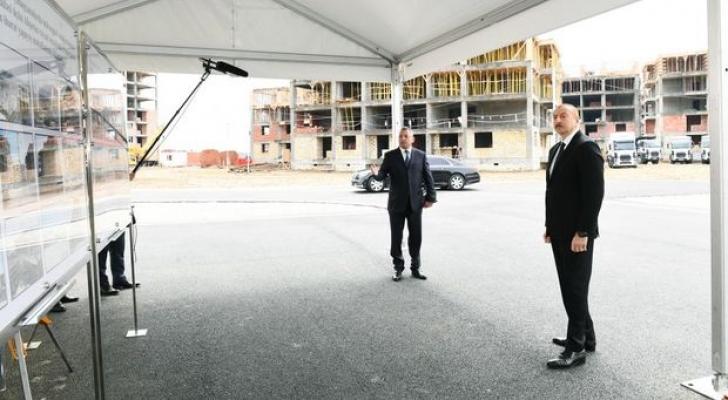 İlham Əliyev məcburi köçkünlər üçün tikilən yaşayış binalarında işlərin gedişi ilə tanış olub - FOTO
